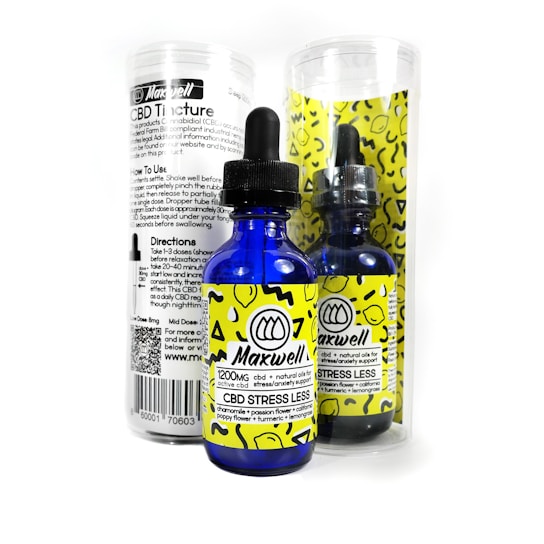 A blue glass dropper bottle labeled 'Maxwell CBD Stress Less' with bright yellow accents and patterns. It is accompanied by a cylindrical clear container that has black text detailing product information and directions. The packaging has a modern and clean design.