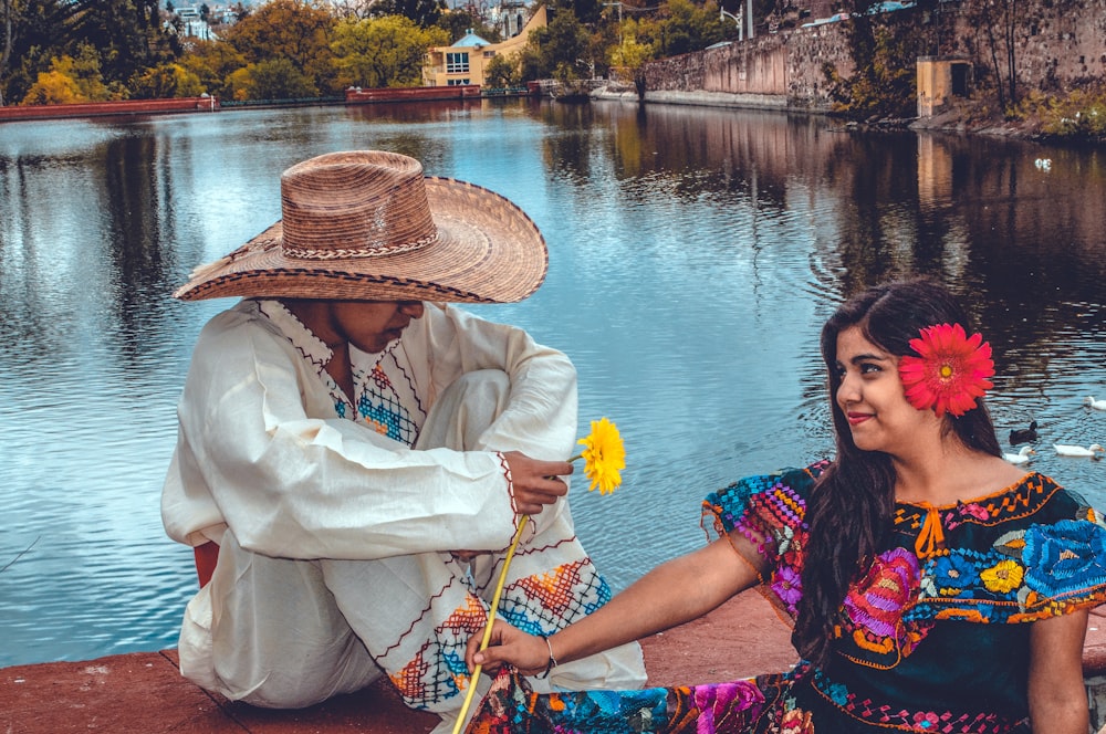 woman sitting beside man