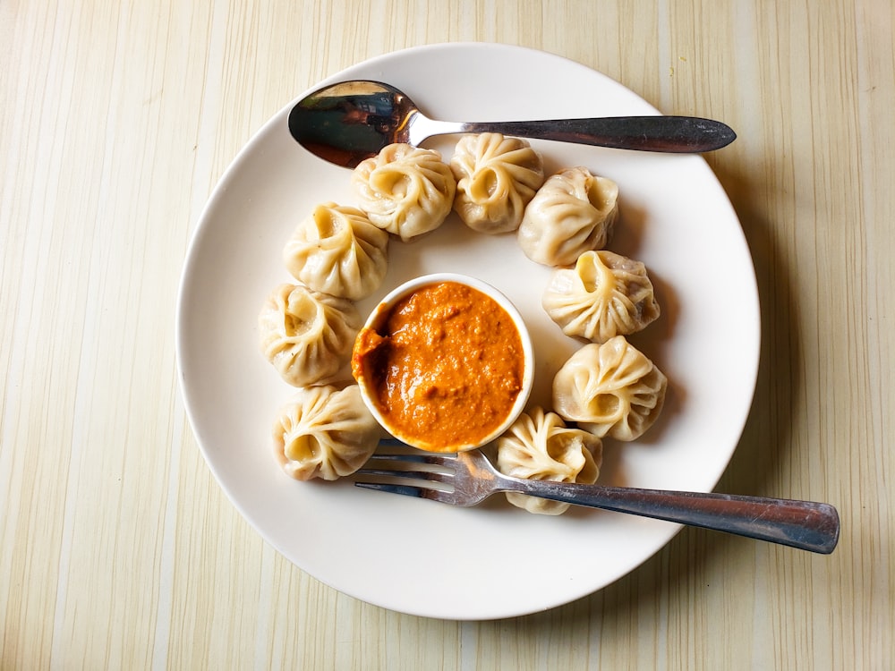 dumplings with orange sauce