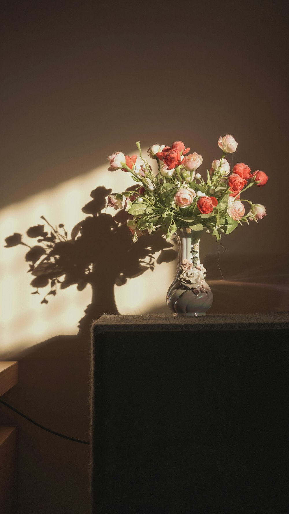 red and pink rose flower arrangement