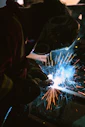 person wearing welding mask photo