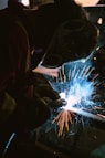person wearing welding mask photo
