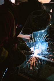 person wearing welding mask photo