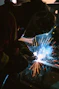 person wearing welding mask photo