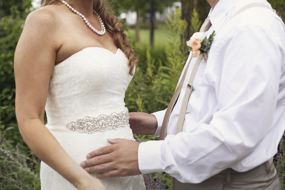 a man and a woman standing next to each other