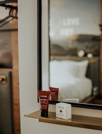 A sleek smart mirror displaying personalized skincare tips with soft LED lighting.