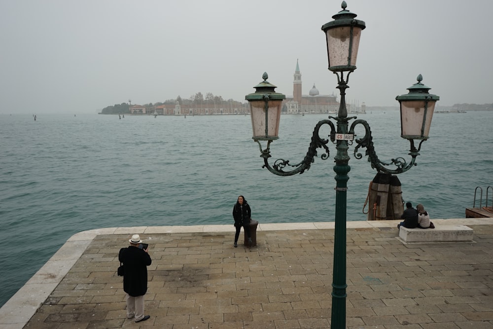 two persons on dock