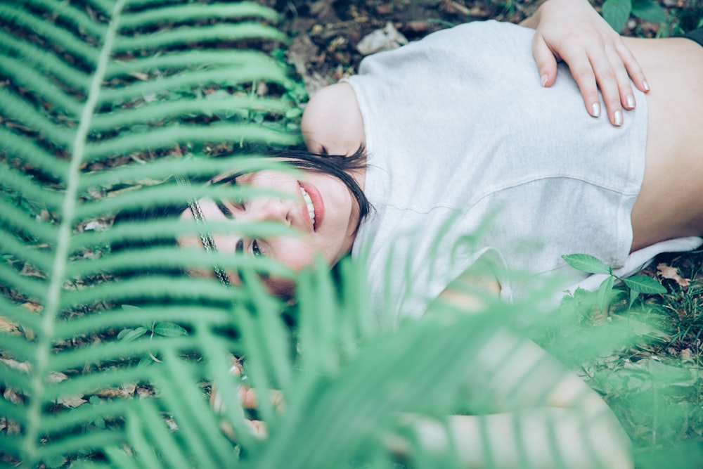 woman lying on ground