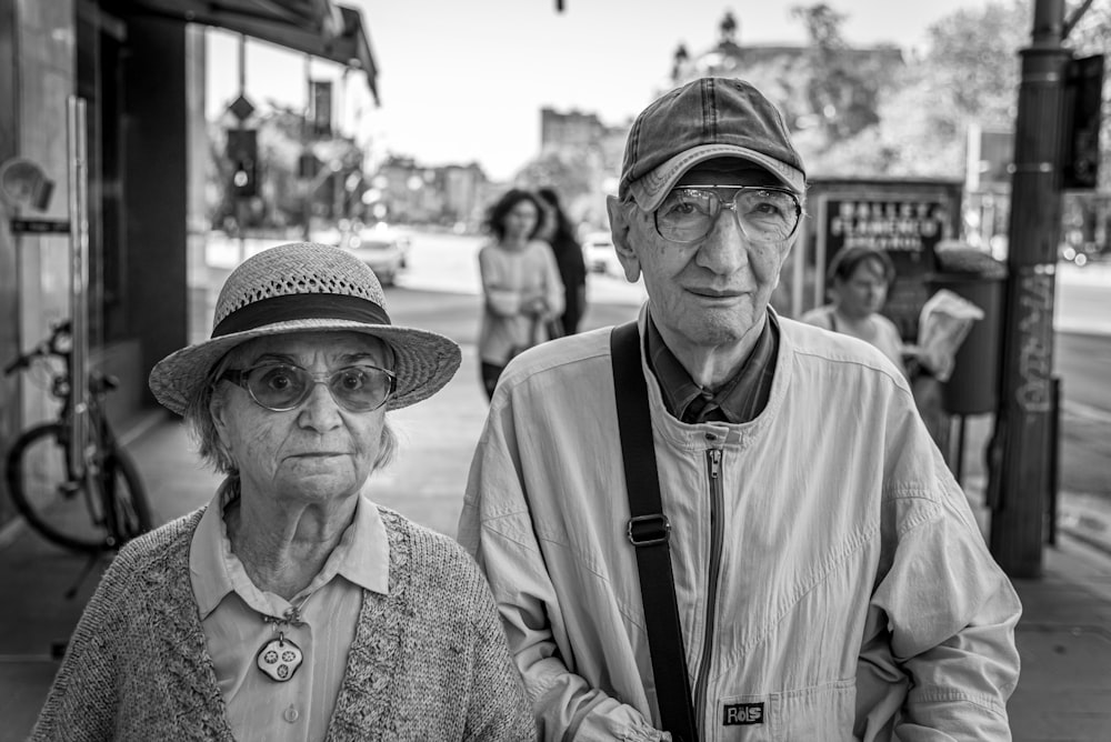 man and woman standing next to each other