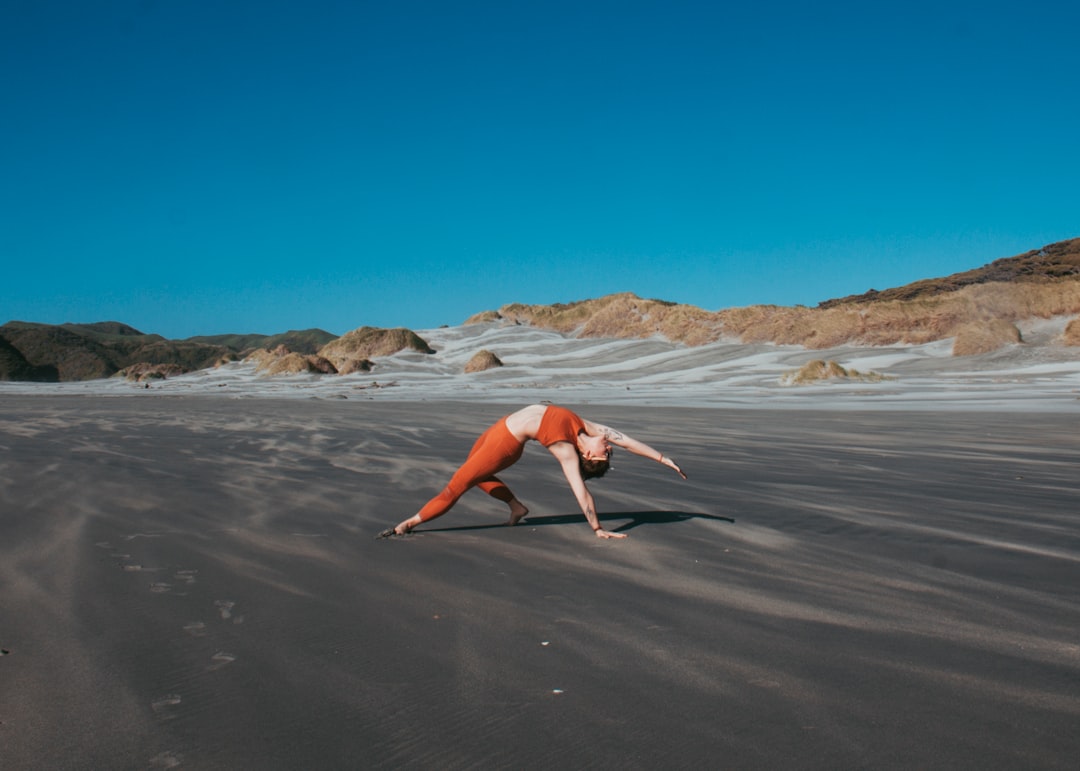 woman bending on ground