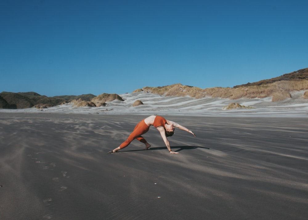 woman bending on ground