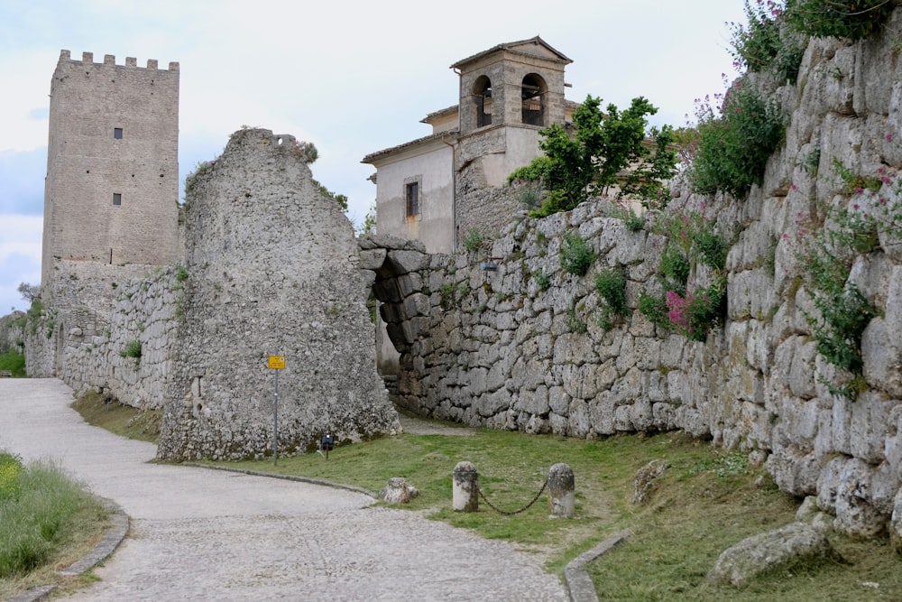 gray stone structure under cloudy sky