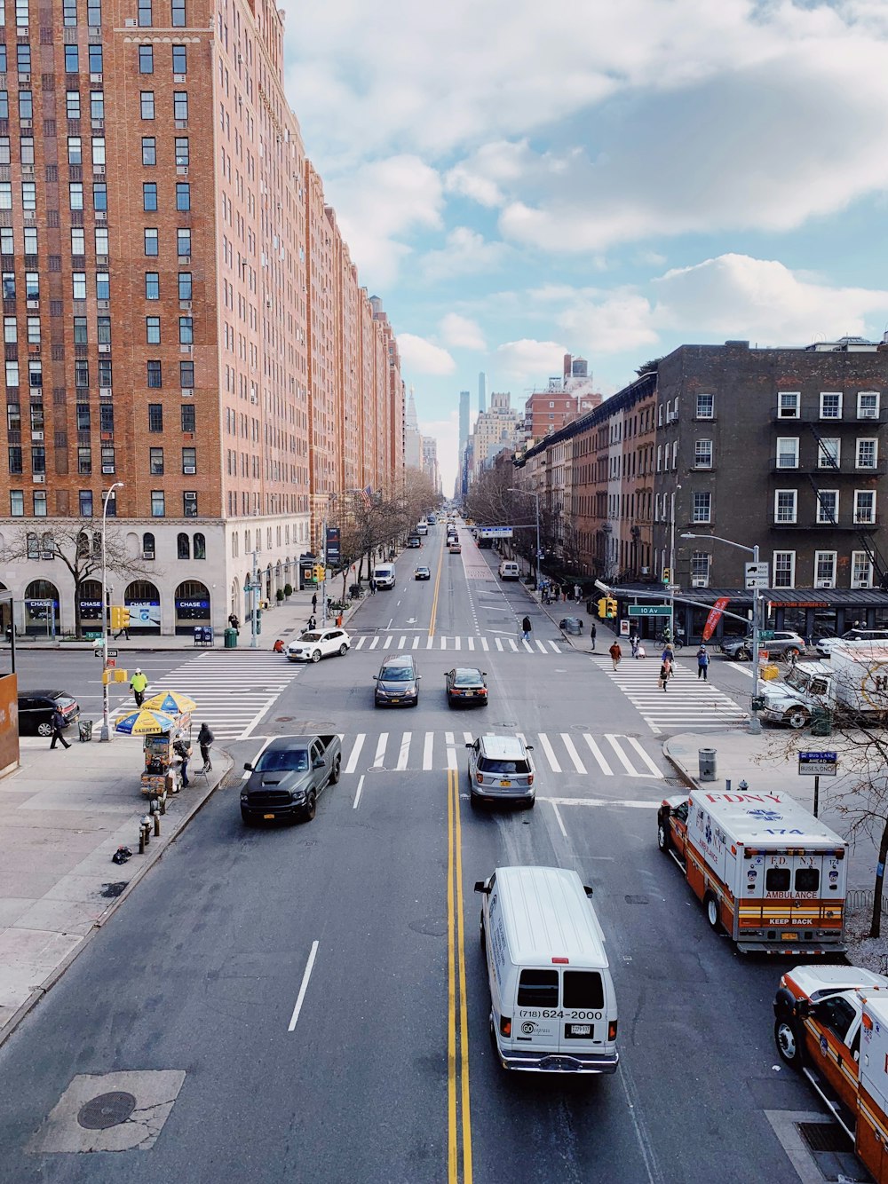 cars crossing on road