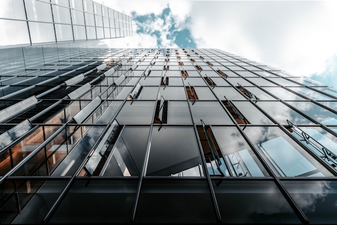 Regional banks are trading at undervalued multiples compared to their historical averages.low angle photo of curtain glass wall building