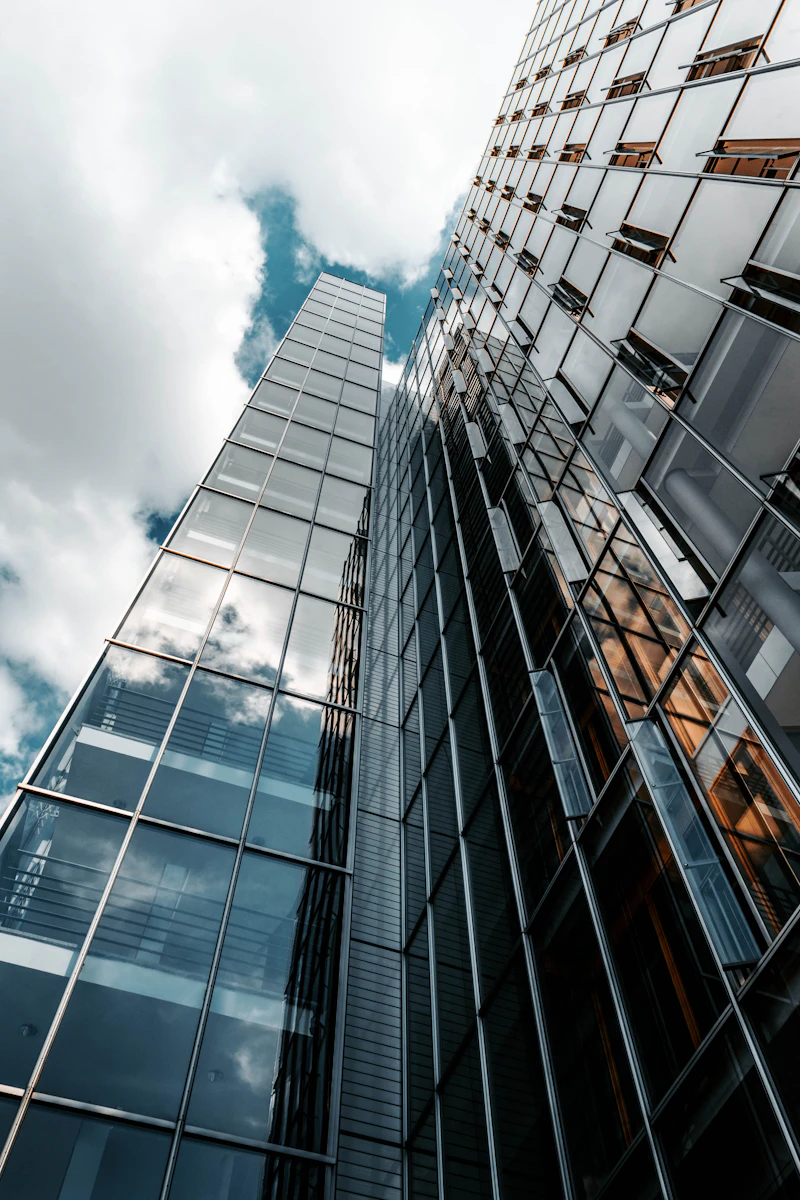 Low angle view of a modern glass office building