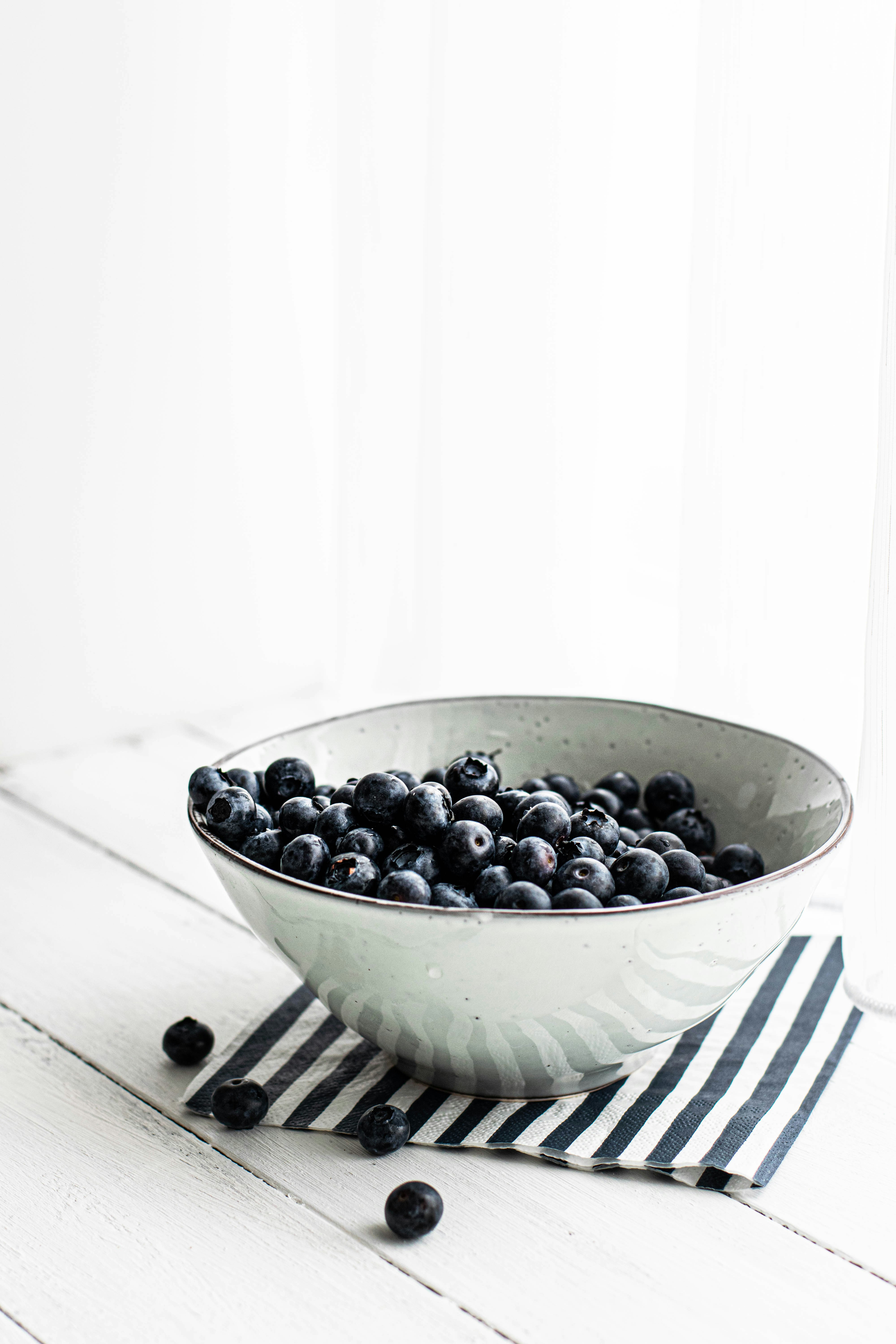 black beans in white ceramic bowl close-up photography