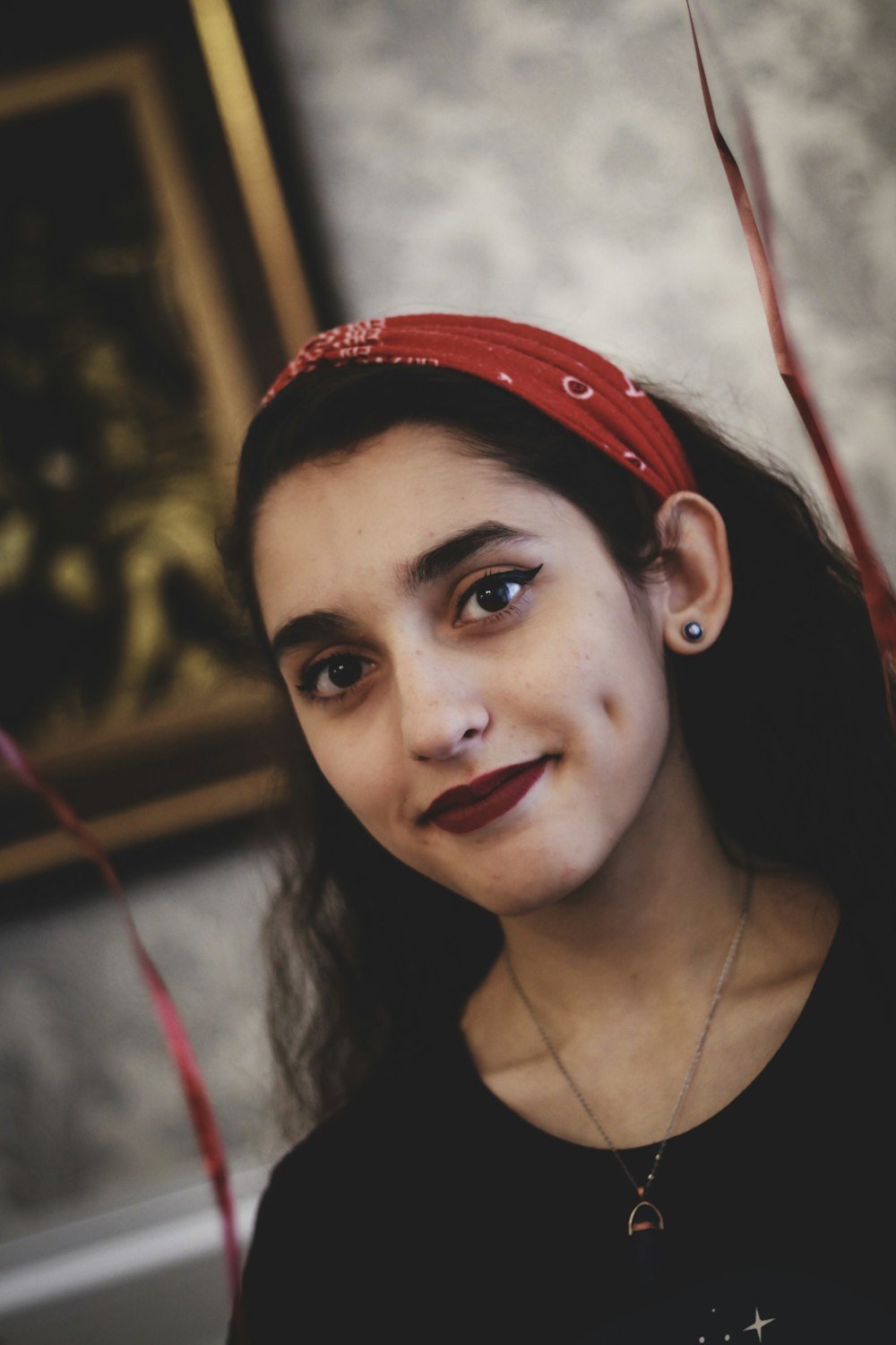 woman in black shirt smiling