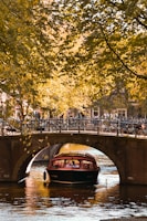 boat passing under river