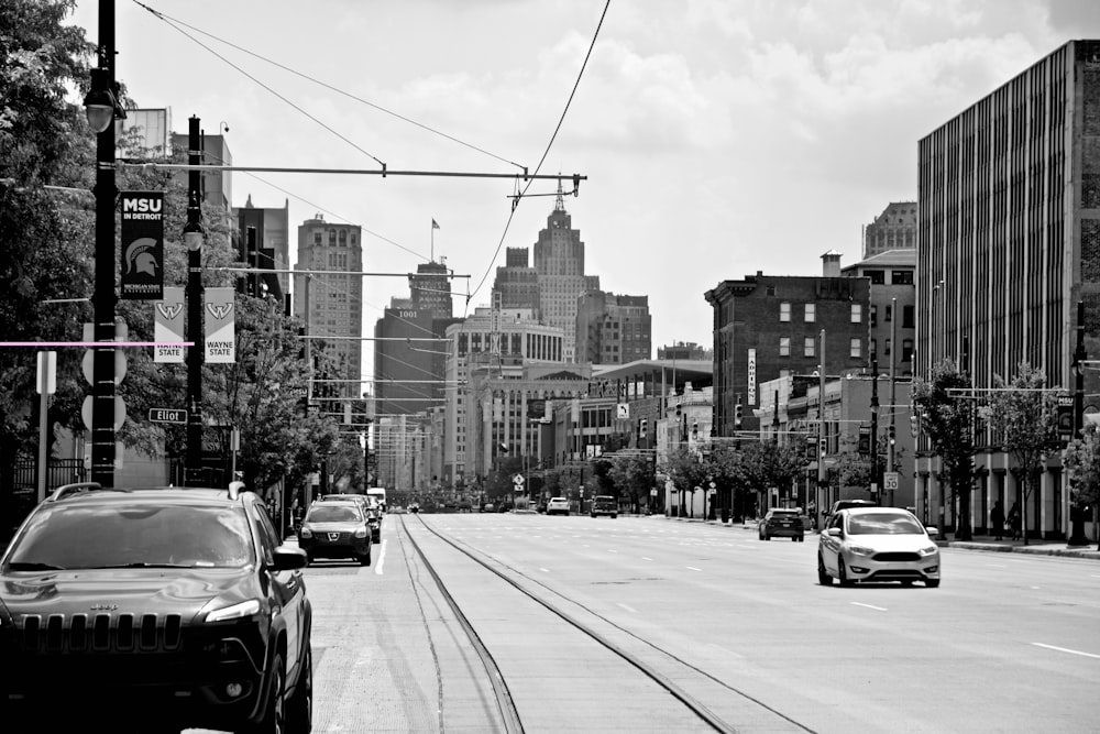 cars on road at the city during day