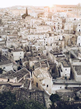 A cinematic view of Dali’s old town with cobblestone streets bathed in soft afternoon light.