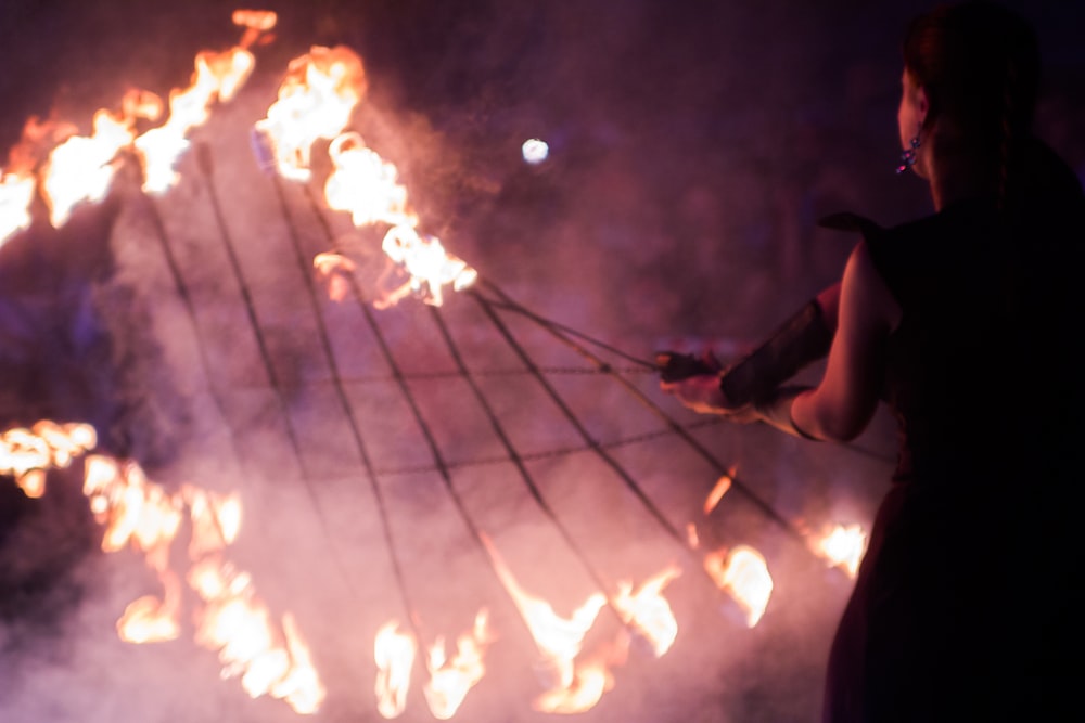 woman performing fire dance