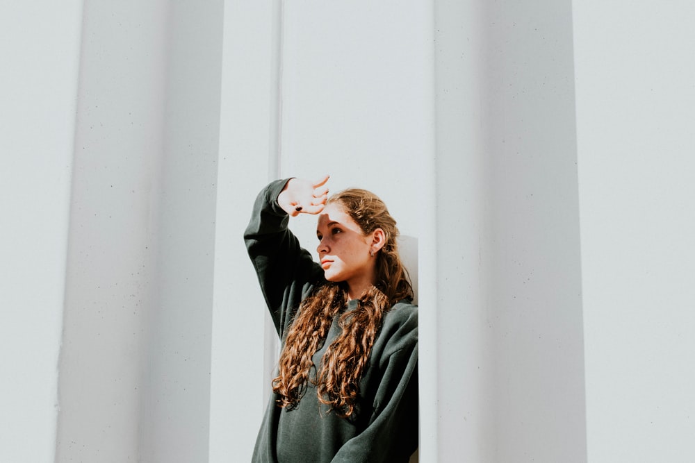 women's green jacket close-up photography