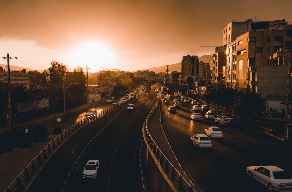 vehicle passing on road during golden hour