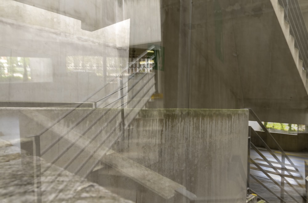 gray cement and metal staircase