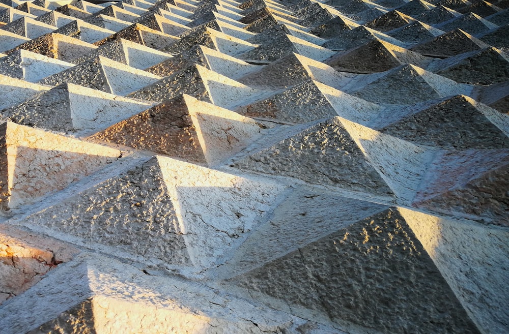 gray cement small pyramids surface