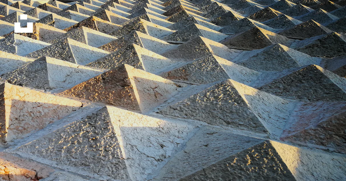 Gray cement small pyramids surface photo – Free Diamonds Image on Unsplash