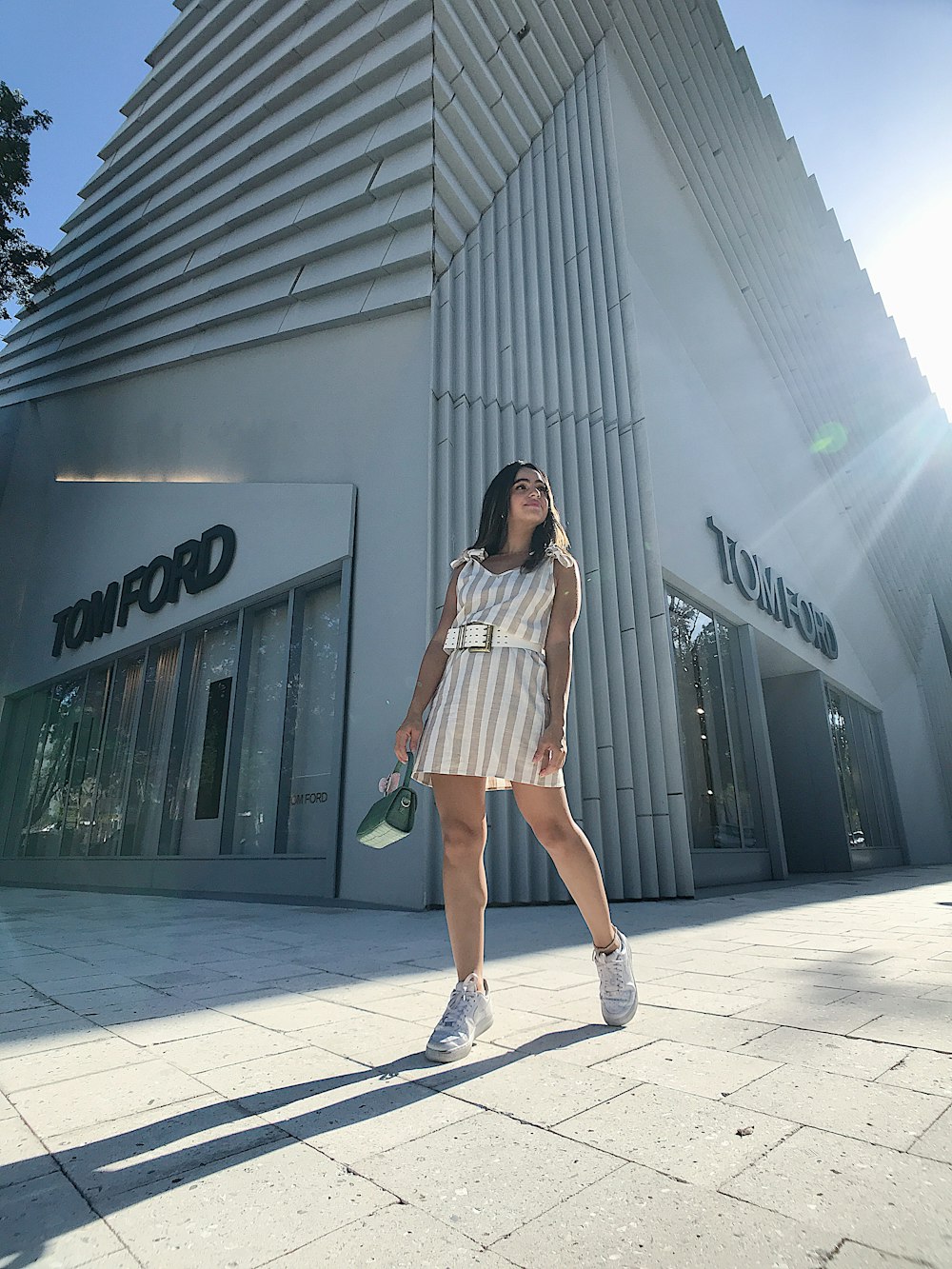 women's white and black striped mini dress close-up photography