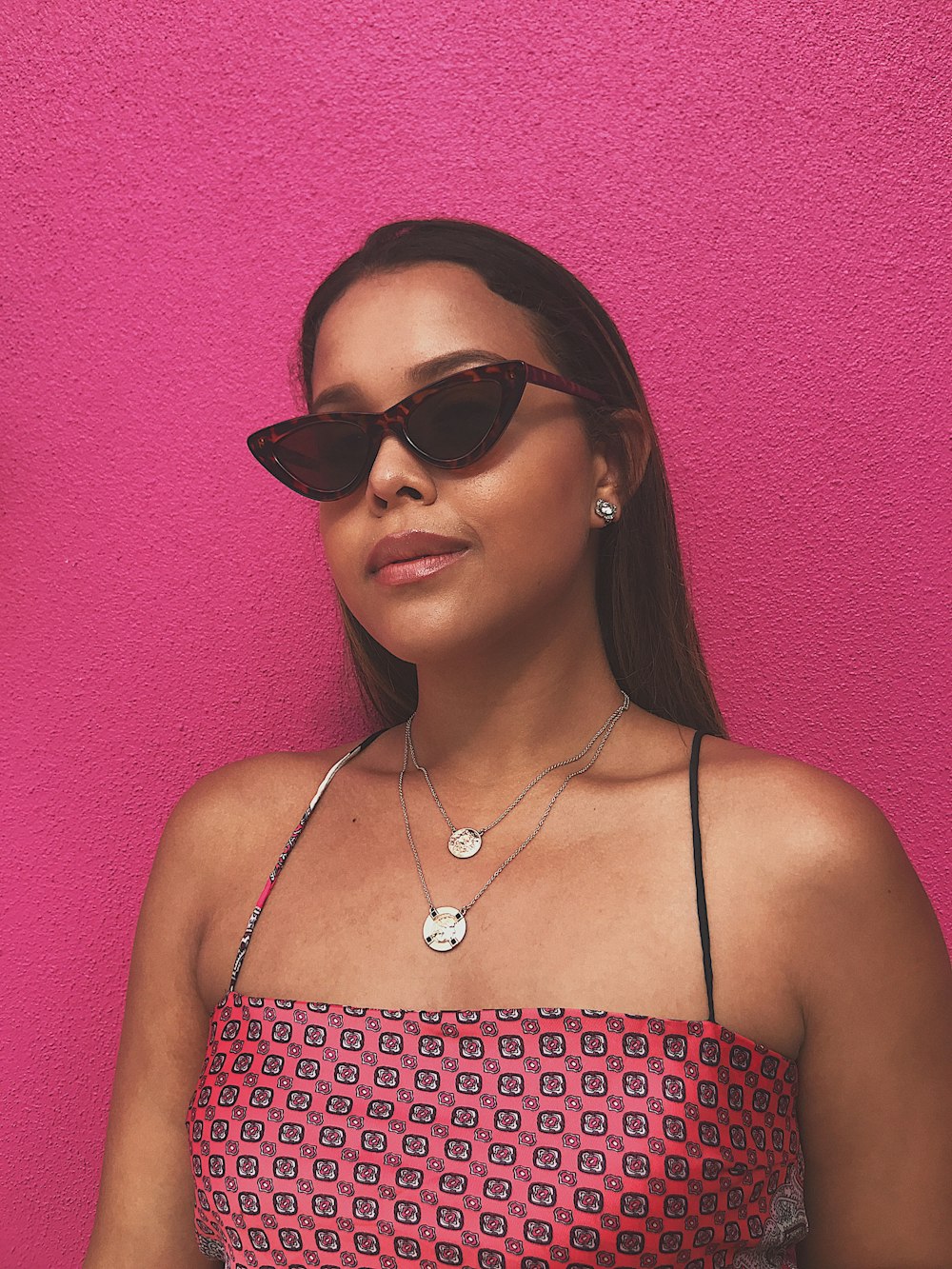 women's black and red framed sunglasses close-up photography