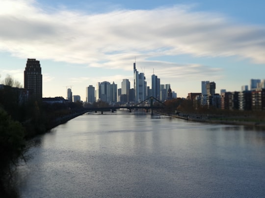 body of water near high buildings at daytime in Frankfurt am Main Germany