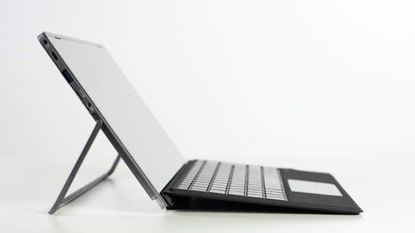 A side view of a slim laptop showing its thin profile and modern design.