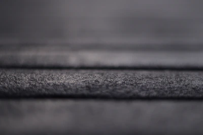 a black and white photo of a piece of cloth