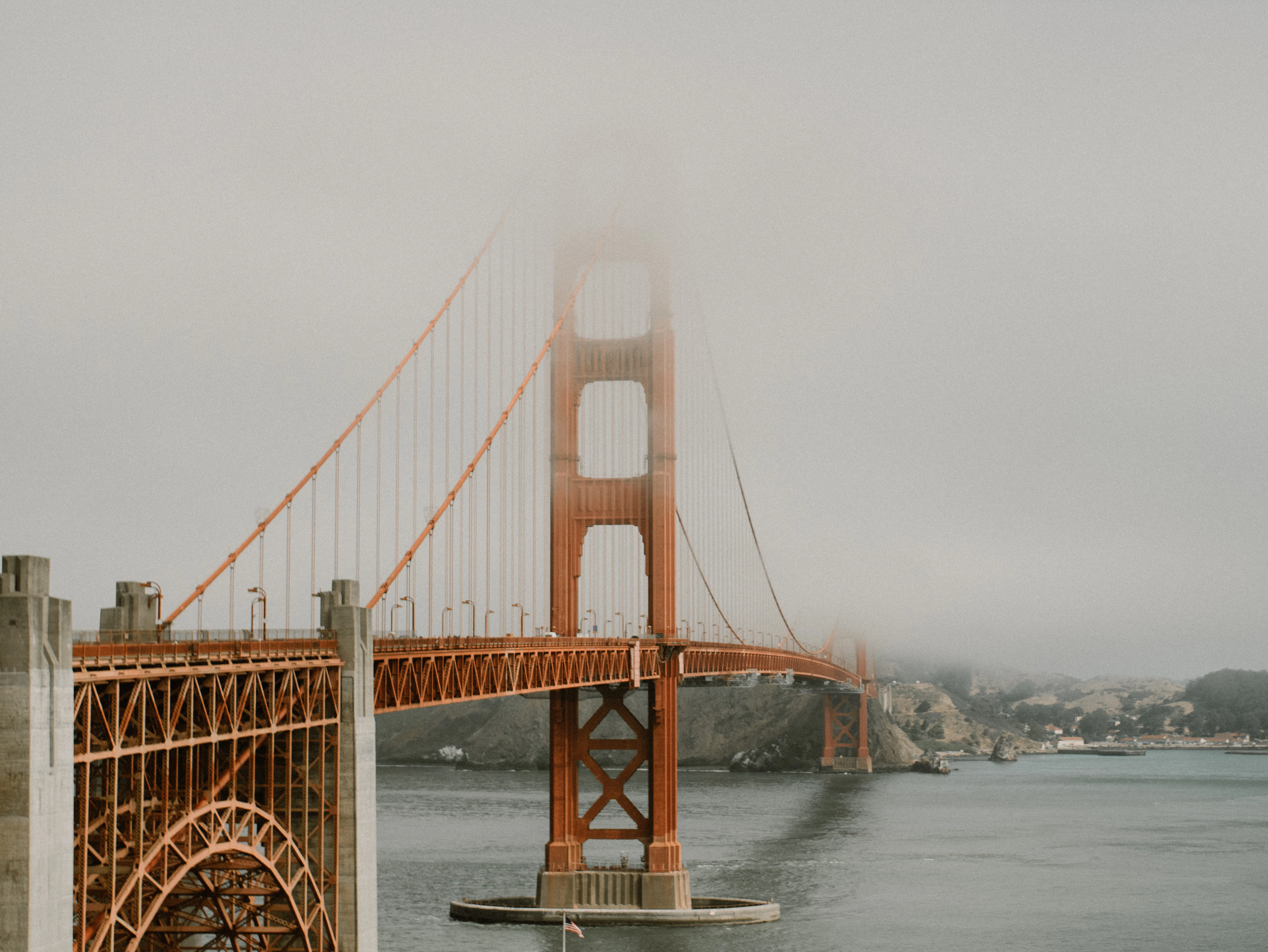 The Golden Gate Bridge disappearing into fog