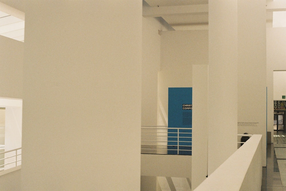 blue door near white wall