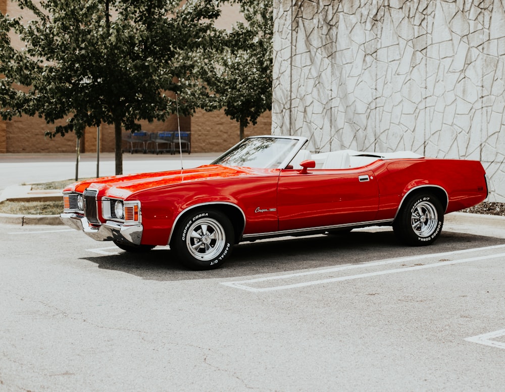 parked red coupe