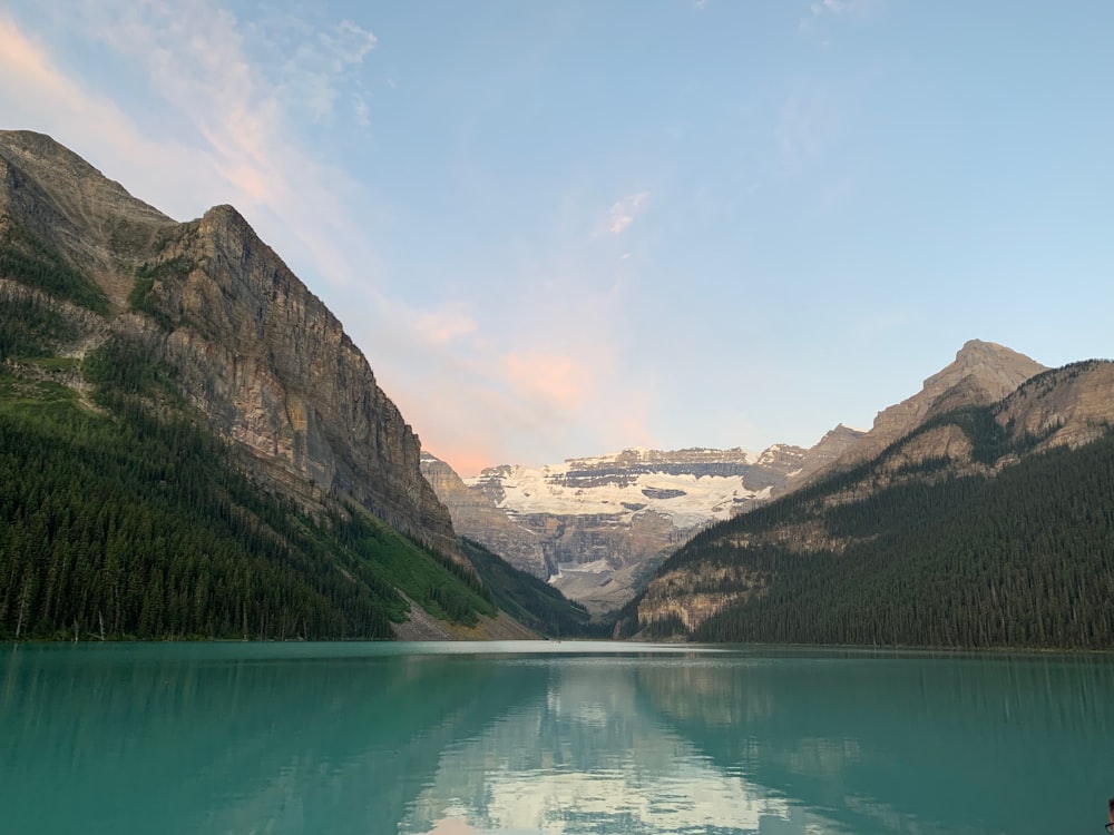 body of water near mountain