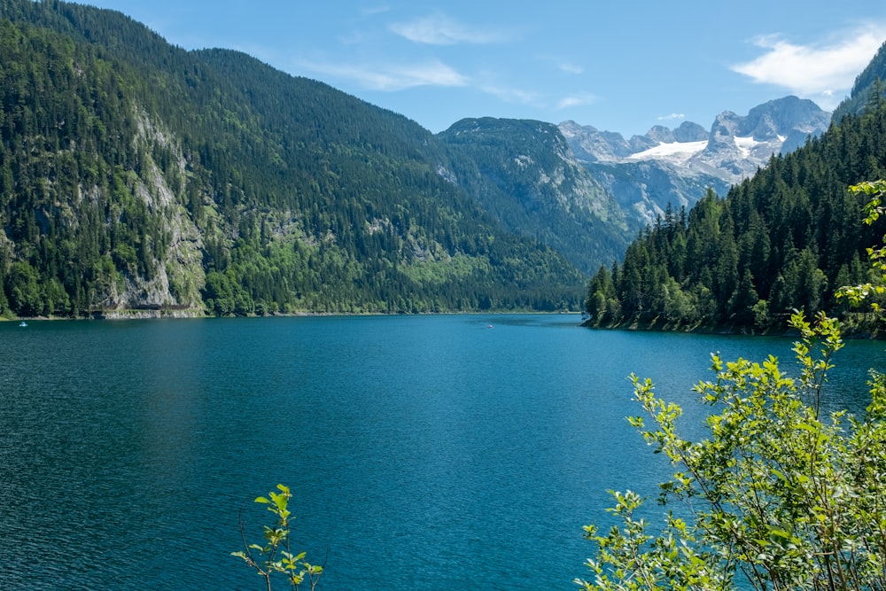 photography of lake and mountain during daytime