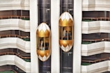 two gold capsule elevator
