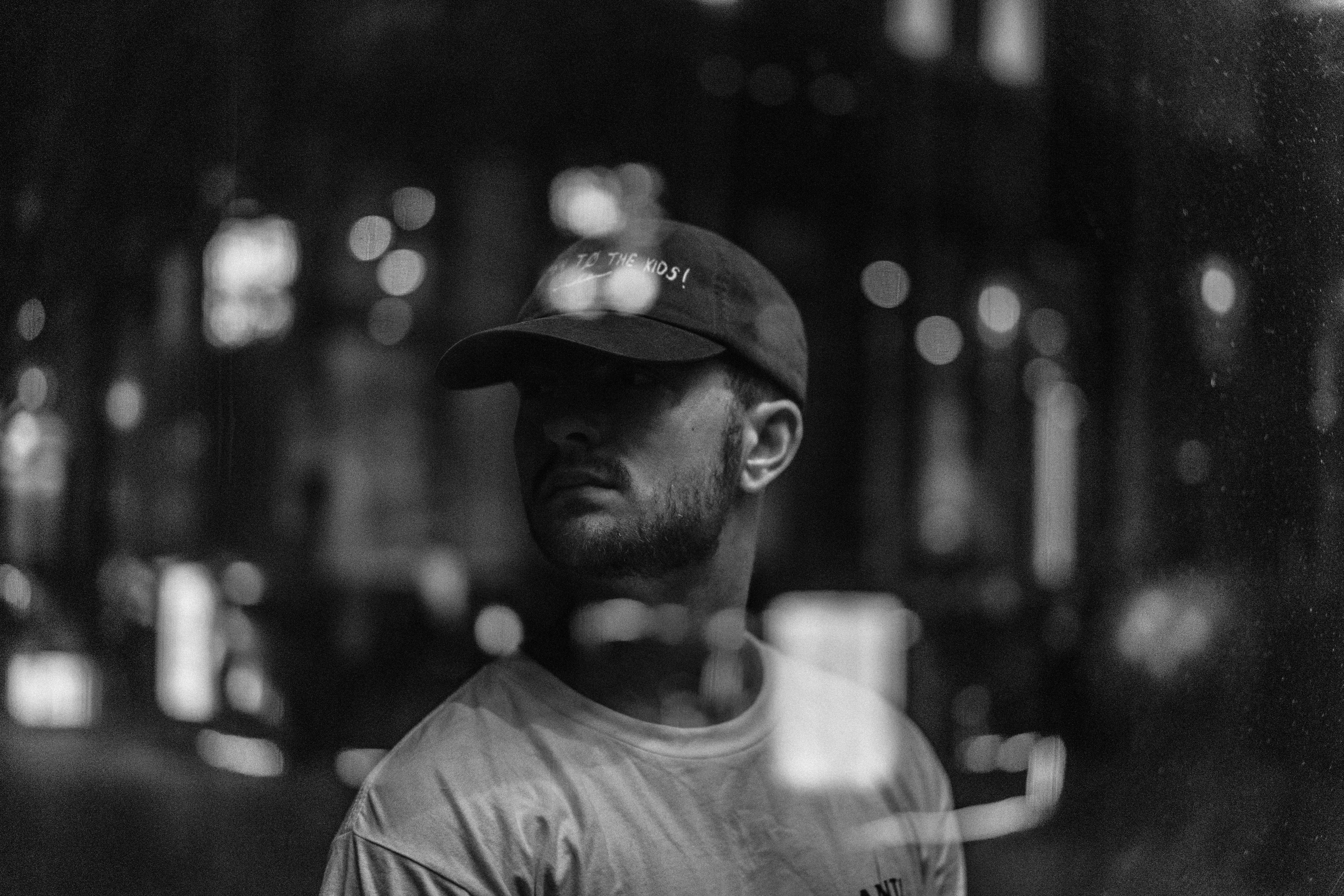men's white crew-neck top close-up photography