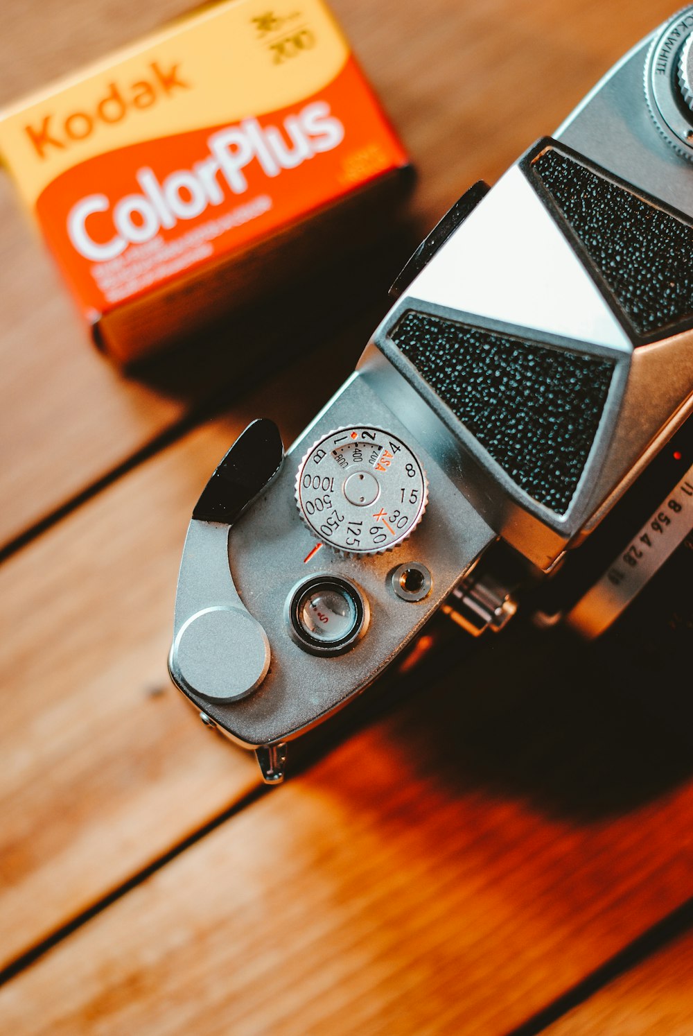 gray camera on table