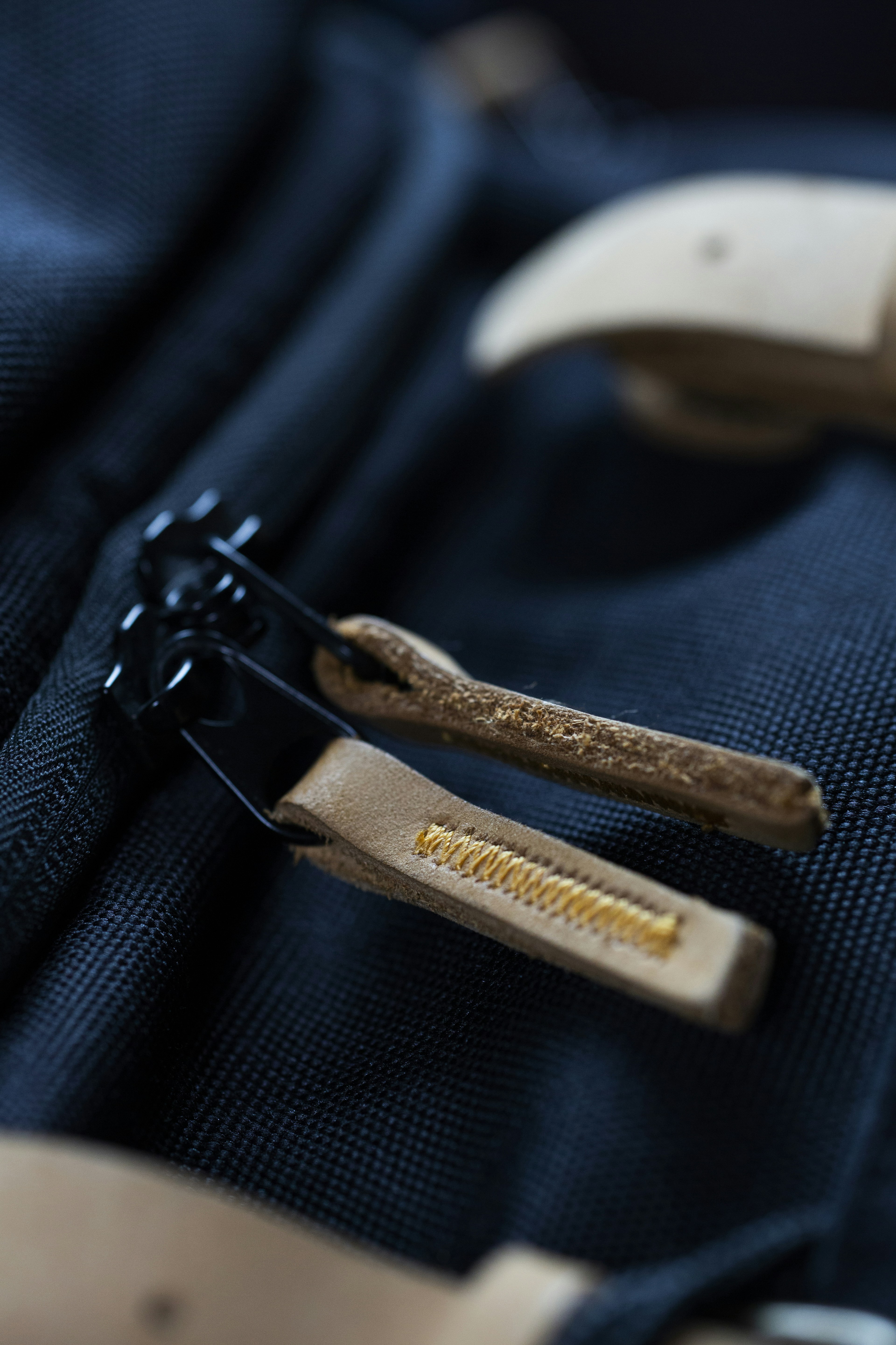 two zipper leather handles