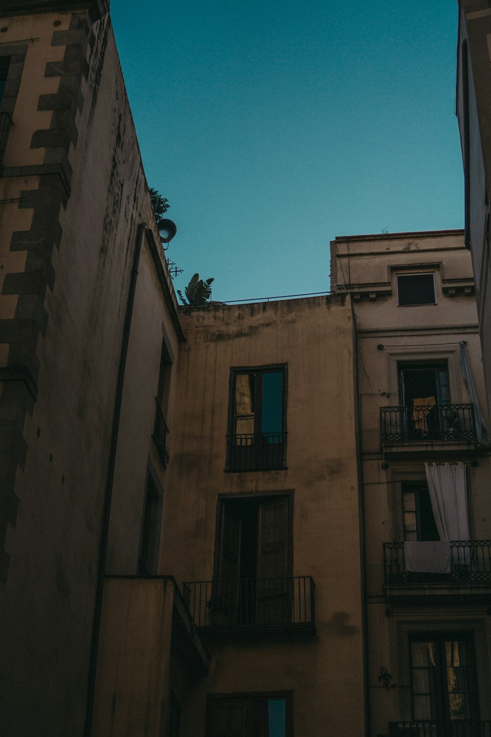 low angle photography of brown concrete building