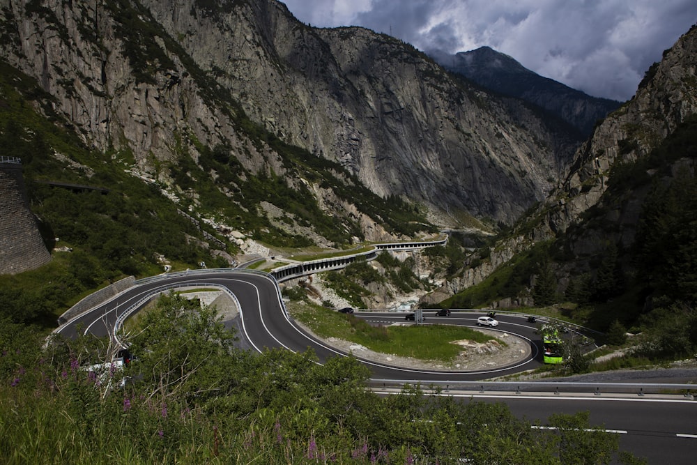 gray concrete road near mountain