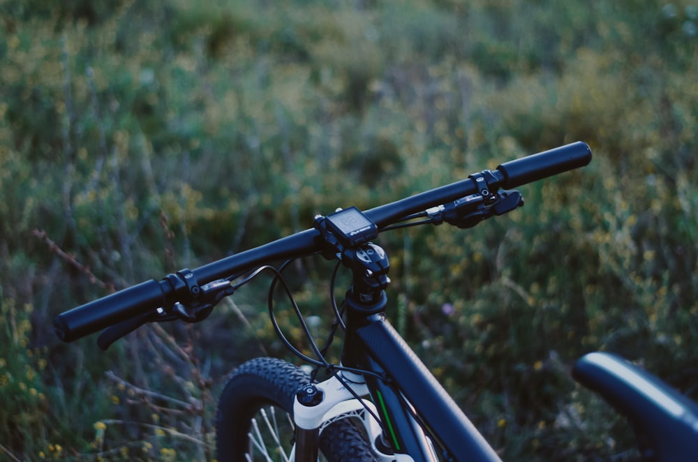 black hiking bike on grass