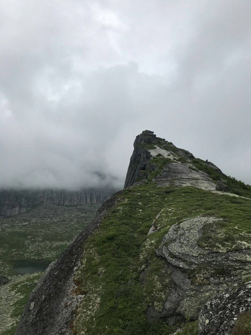 a rocky outcropping on a cloudy day