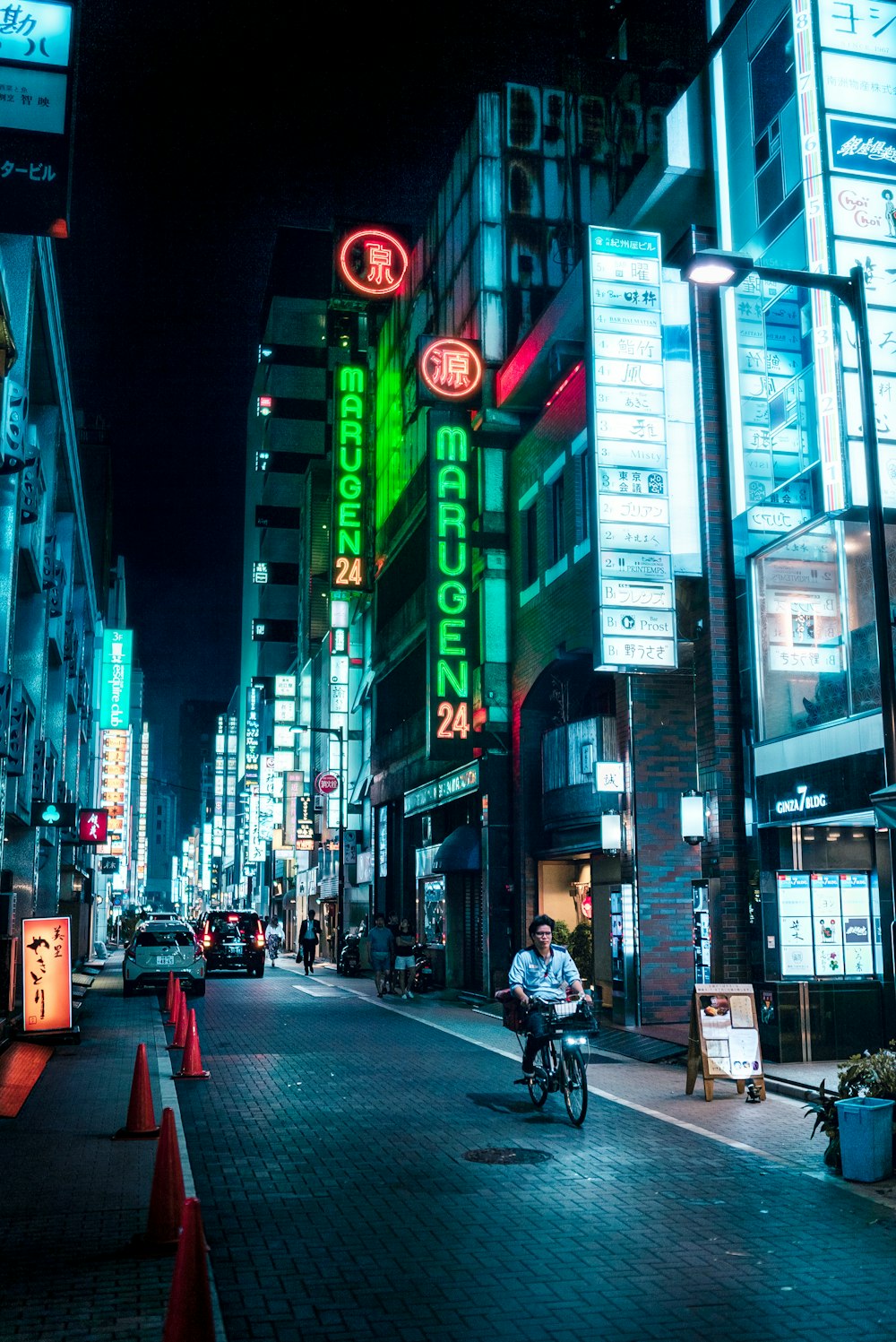 man riding on bike at night