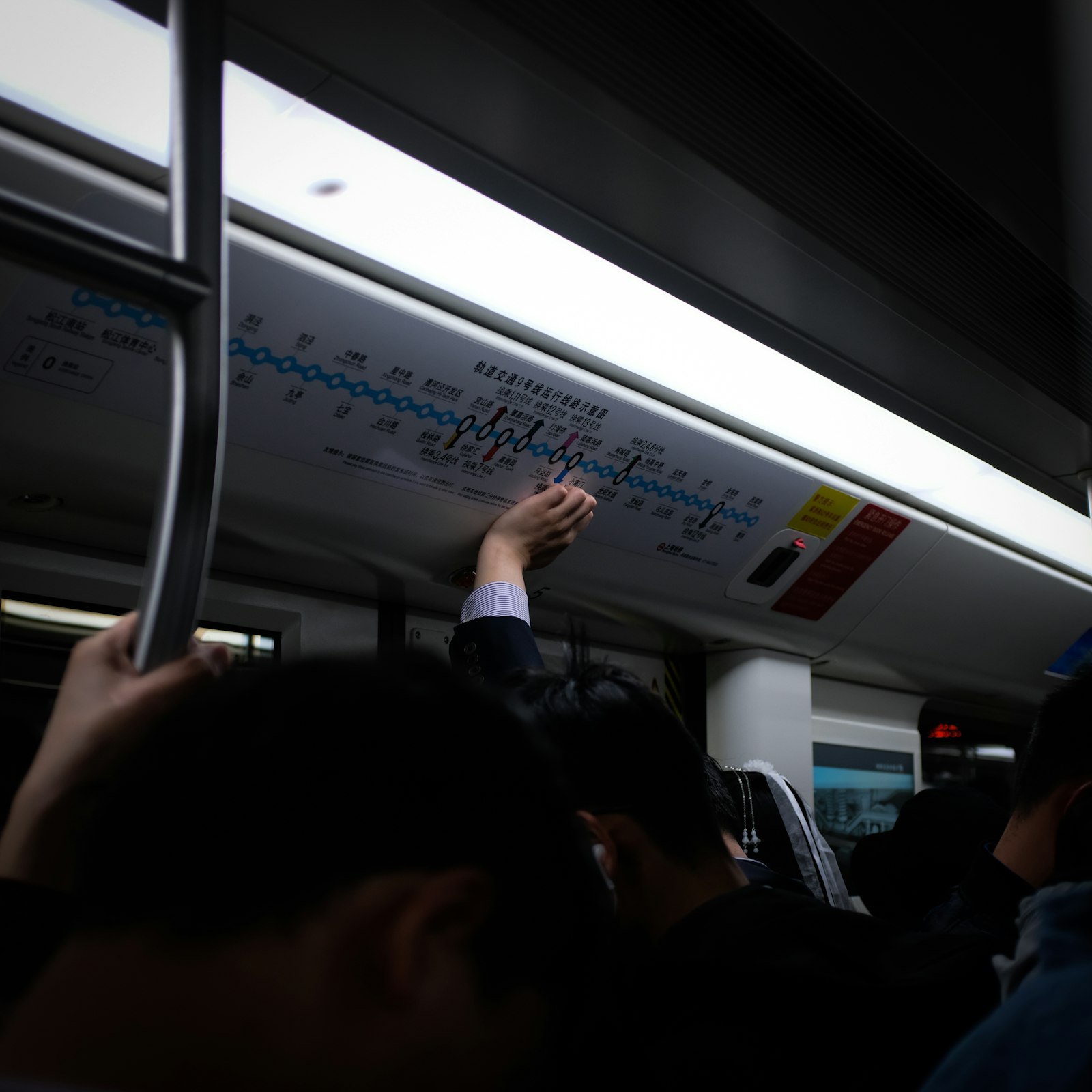 Fujifilm X100F sample photo. Man standing in train photography